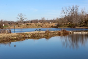 The picnic table on the small island at the lake.