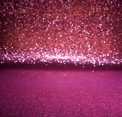 Pink glitter lights christmas background. defocused