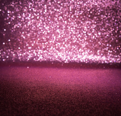 Pink glitter lights christmas background. defocused