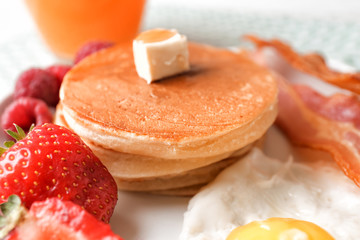 Tasty breakfast with pancakes on plate, close up