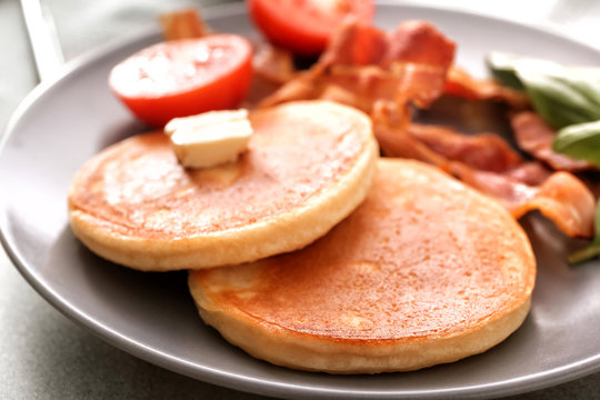 Tasty breakfast with pancakes on plate, close up