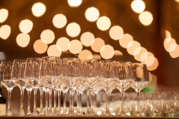 Wine glasses inwarm light  loft restaurant