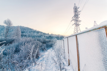 Electricity tower in the hoarfrost.