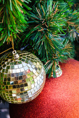 Beautiful decorated christmas tree with gold and red bauble