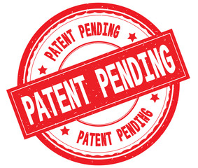 PATENT PENDING written text on red round rubber stamp.