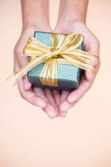 giving gift box in with hands On special days  for special person and copy space background