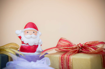 santa claus doll christmas background and gift box and copy space