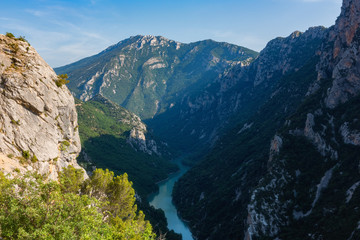 Obraz premium Verdon Gorge (Gorges du Verdon), amazing landscape of the famous canyon with winding turquoise-green colour river and high limestone rocks in French Alps, Provence, France