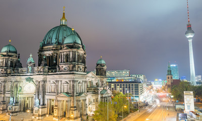 Naklejka premium BERLIN - NOVEMBER 16, 2013: City aerial view at night. Berlin attracts 15 million people every year