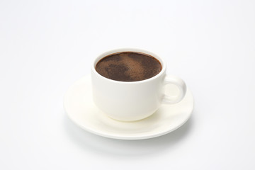 white Cup with black coffee on white background