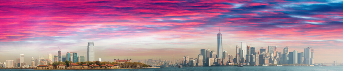 Fototapeta na wymiar Jersey City, Ellis Island and Manhattan, view at dusk