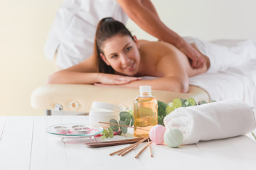 Obraz na płótnie Canvas picture of happy beautiful woman in massage salon