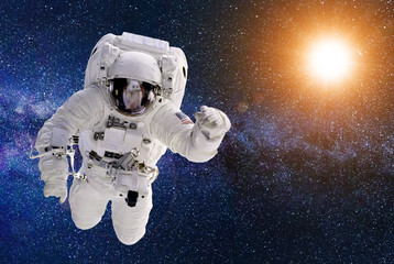 Astronaut in outer space - elements of this image furnished by NASA
