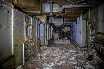 Fototapeta na wymiar Old rusty air conditioning system in abandoned Soviet bunker