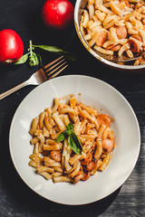 pasta with tomato sauce and basil