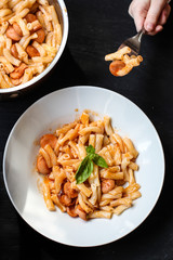 pasta with tomato sauce and basil
