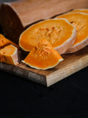 fresh pumpkin chopped on a round piece