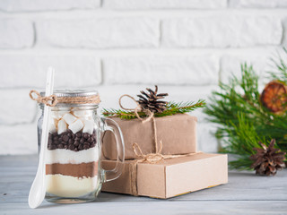 Hot chocolate mix in mason jar and gift boxes