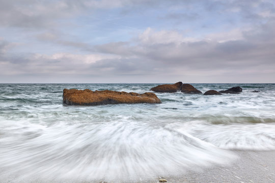 Long exposure of waves on rocks in sea, Odessa, Odeska Oblast, Ukraine, Europe