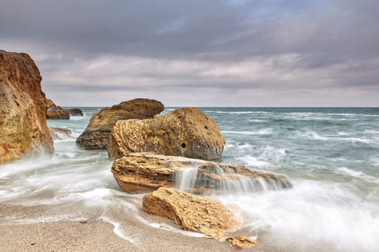 Long exposure of waves on rocks in sea, Odessa, Odeska Oblast, Ukraine, Europe