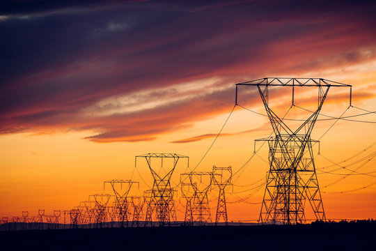 Electricity pylons at sunset, Enterprise, Oregon, United States, North America