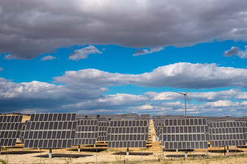 Fototapeta premium Photovoltaic and wind park in winter II