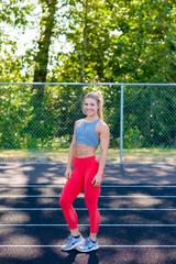 Young Female Athlete Working Out on Track