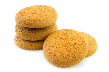 Several oat cookies isolated on white backgrounds