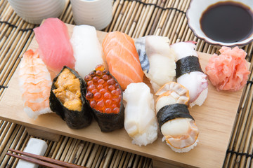 nigiri sushi on wooden board
