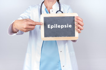 Ärztin mit Schild Epilepsie