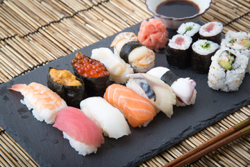 sushi on stone board
