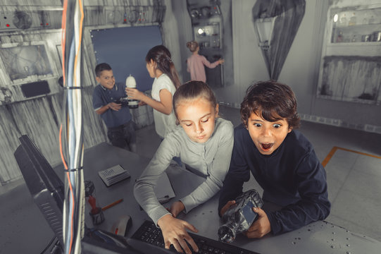  children play in the quest room of a inscrutable bunker