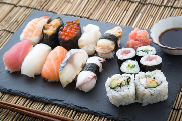 sushi on stone board