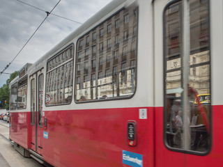 Naklejka premium Old tram and Vienna State Opera