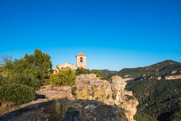 Fototapeta na wymiar View of the Romanesque church of Santa Maria de Siurana, in Siurana, Tarragona, Catalunya, Spain. Copy space for text.