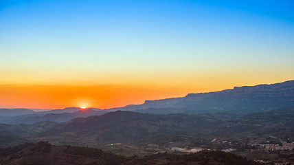 View of the mountain landscape at sunset in Siurana de Prades, Tarragona, Spain. Copy space for text.