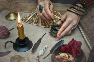 Magic potion. Tarot cards on fortune teller desk table. Future reading.