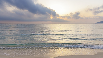 Cloudy sunrise at sea