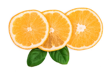 Slices of orange with leaves isolated on white background. Flat lay, top view. Fruit composition
