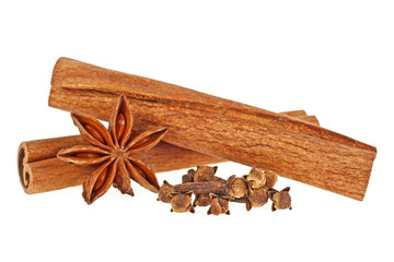 Cloves, anise and cinnamon isolated on white background