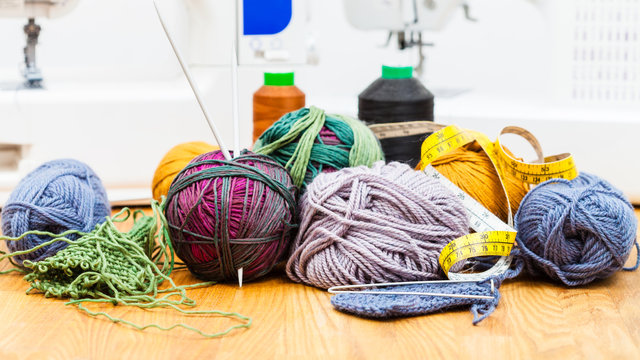 various knitting tools and sewing machines