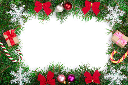 Christmas frame decorated with snowflakes isolated on white background with copy space for your text. Top view.