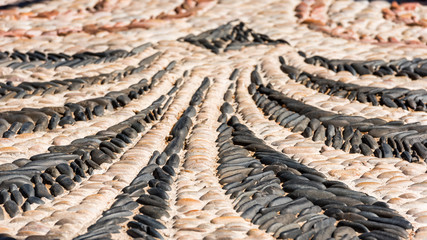 Abstract image of an old pavement  in Tarragona, Catalunya, Spain. Close-up.