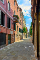 Fototapeta na wymiar Colorful street in Burano, near Venice, Italy.