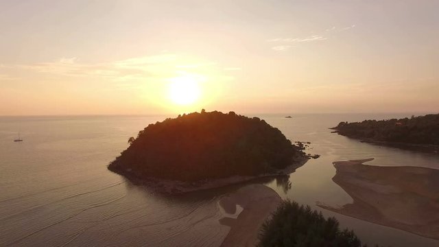 stunning sunset at Kala island. Layan beach and Bangtoa beach is the same beach the left side is Bangtoa beach the right side is Layan beach in the end of Layan beach has Kala island

