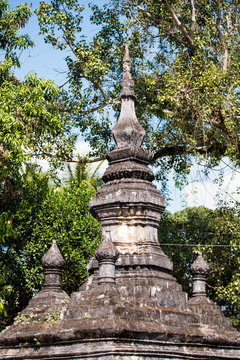 Pagoda in the temple Wat Sensoukaram in Louangphabang, Laos. Vertical.