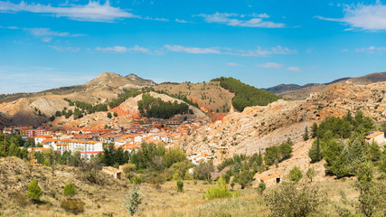 Fototapeta na wymiar View of the mountain landscape and the city of Molina de Aragon, Guadalajara, Spain. Copy space for text.