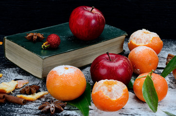 fruit with book  on table