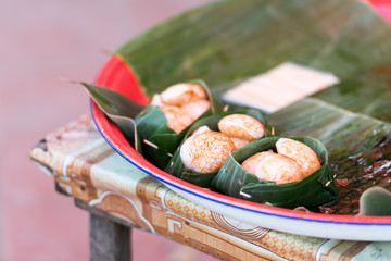 Laotian meat in a banana leaf, Luang Prabang, Laos. Close-up.