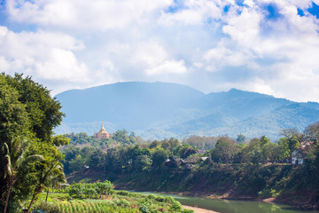 View of the Nam Khan river, Luang Prabang, Laos. Copy space for text
